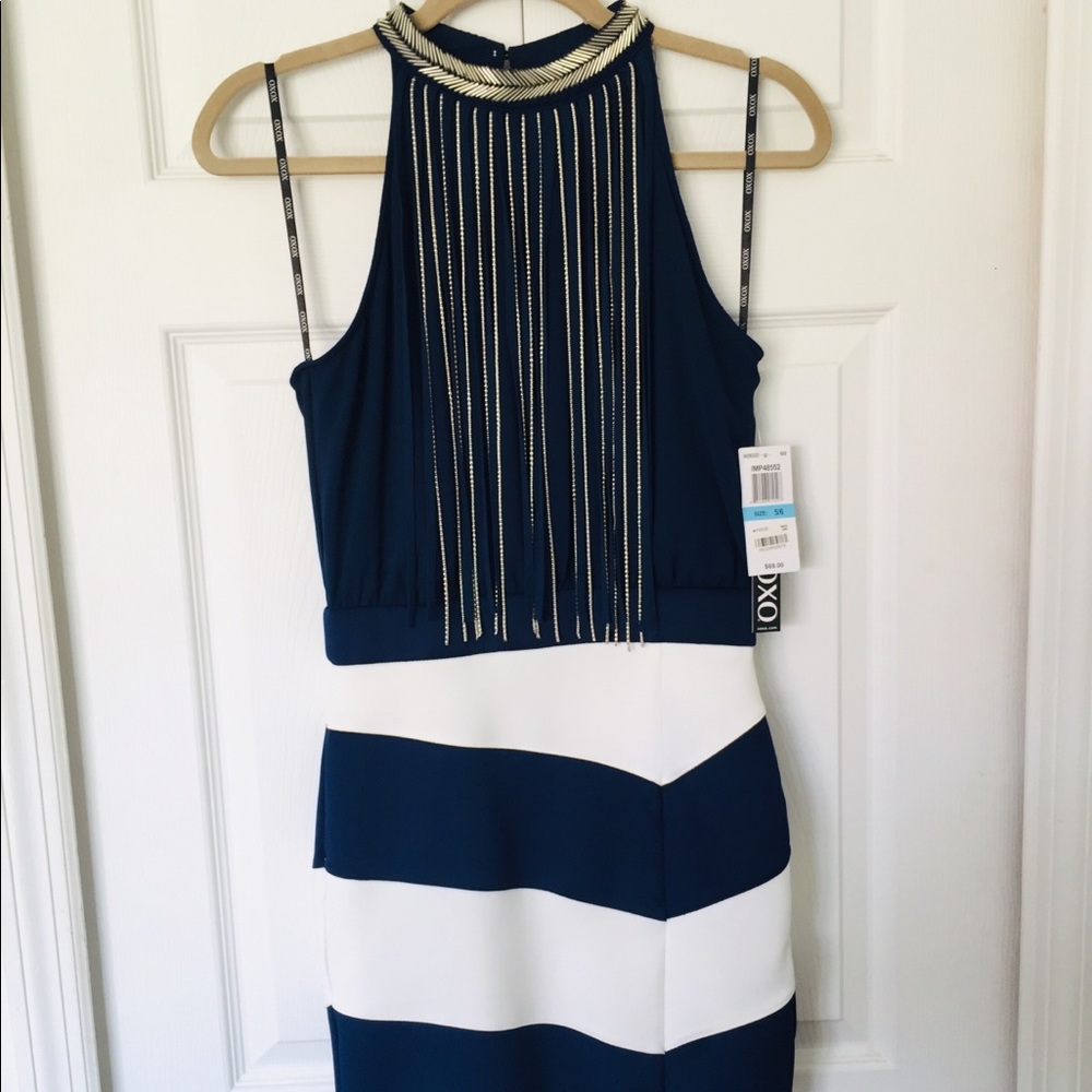 XOXO plus and white party dress